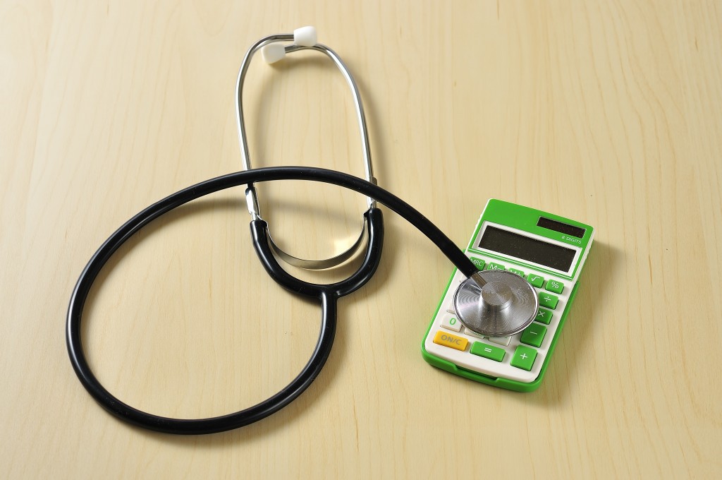 stethoscope and calculator 